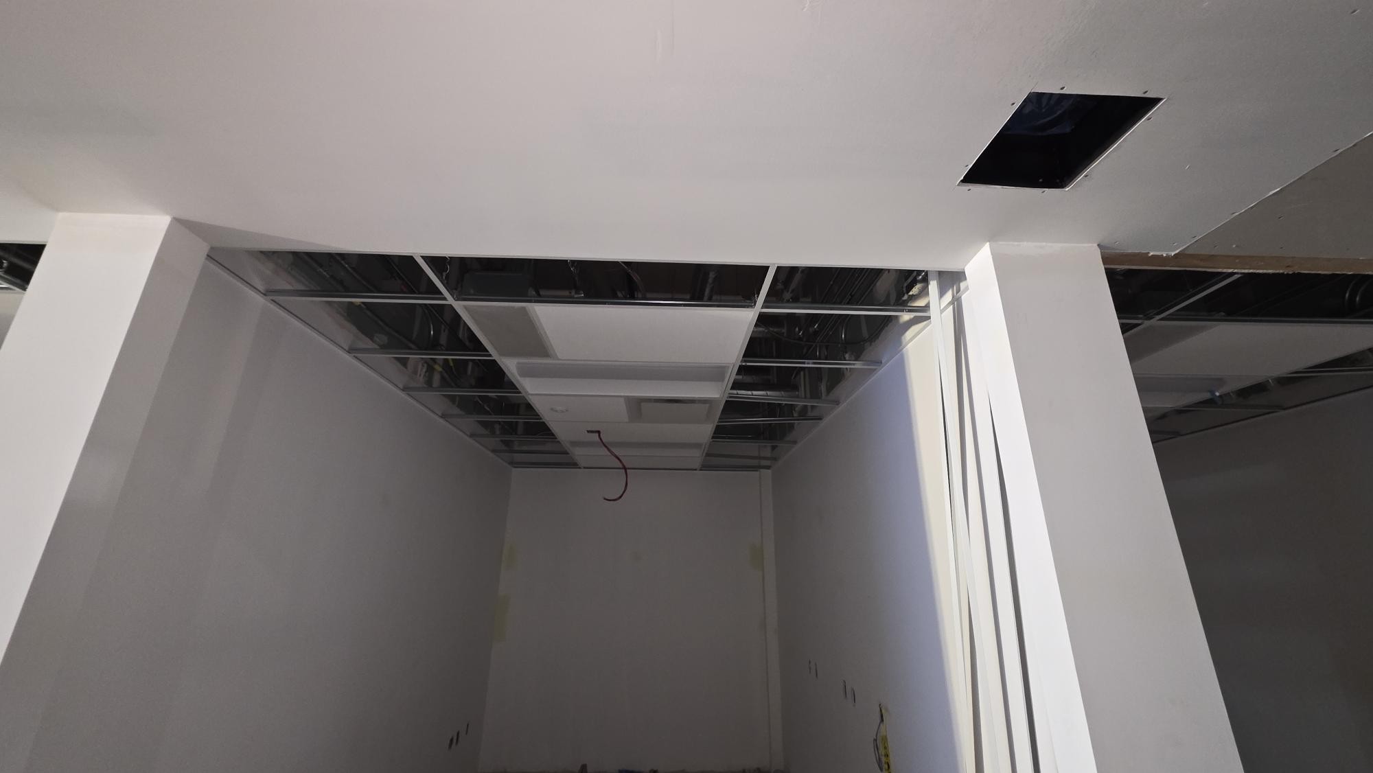 A closer view of the room edge and open ceiling area.